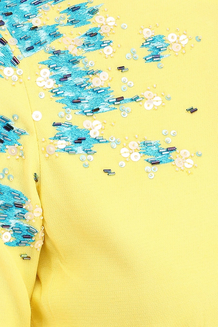 Yellow and blue embroidered top available only at Pernia's Pop Up Shop.
