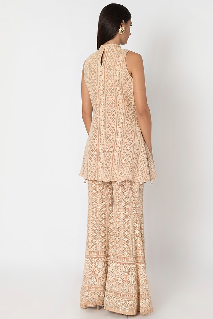 Nude Embroidered Lucknowi Peplum Top With Wedding Sharara Pants by Sole Affair at Pernia's Pop Up Shop