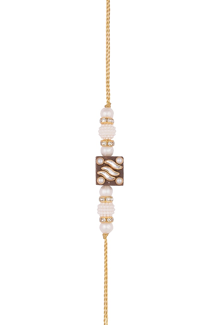 Gold Finish Kundan & Pearl Embellished Rakhi by SONNET at Pernia's Pop Up Shop