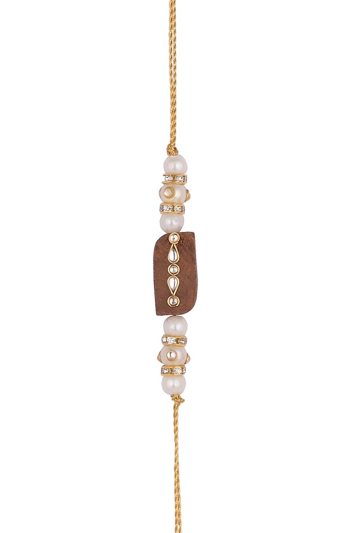 Gold Finish Pearl & Kundan Embellished Rakhi by SONNET at Pernia's Pop Up Shop