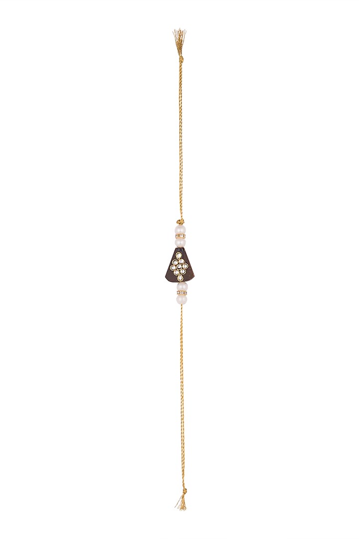 Gold Finish Pearl Embellished Rakhi by SONNET at Pernia's Pop Up Shop