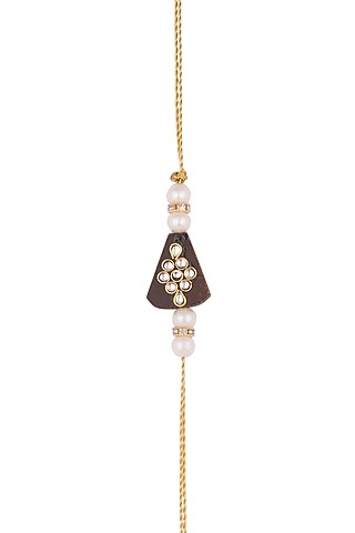 Gold Finish Pearl Embellished Rakhi by SONNET