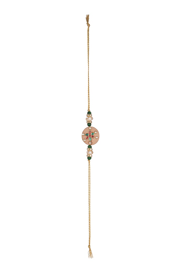 Gold Finish Kundan Rakhi With Wooden Base by SONNET at Pernia's Pop Up Shop