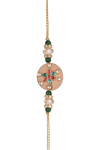 Gold Finish Kundan Rakhi With Wooden Base by SONNET