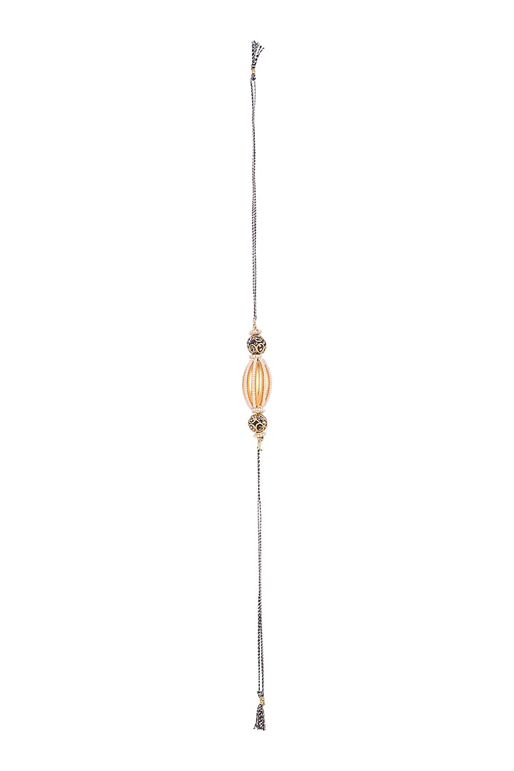 Gold Finish Metal Bead & Pearl Rakhi by SONNET at Pernia's Pop Up Shop