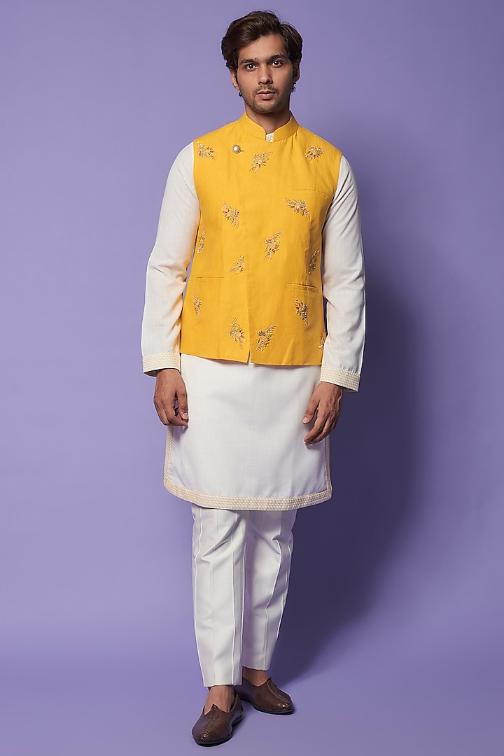 Yellow Linen Embroidered Bundi Jacket With Kurta Set by SUHAIL HAFEEZ