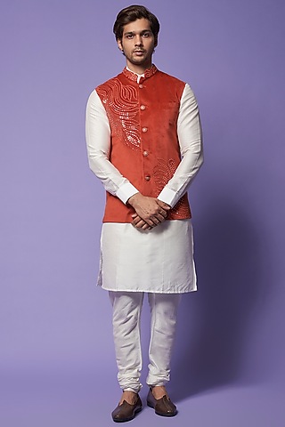 Orange Suede Velvet Embroidered Bundi Jacket by SUHAIL HAFEEZ