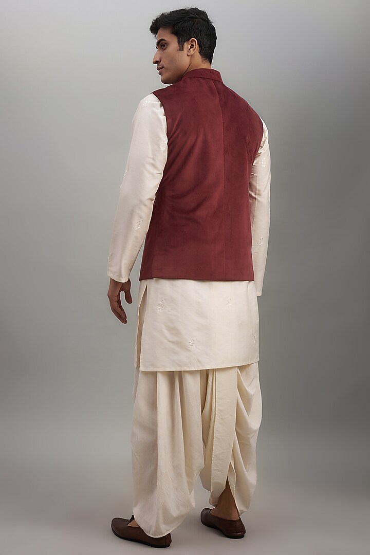 Maroon Suede Velvet Embroidered Bundi Jacket by SUHAIL HAFEEZ at Pernia's Pop Up Shop