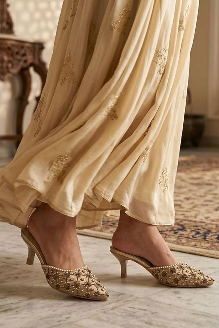 Beige Faux Leather Pearl Embellished Mules by Sole House at Pernia's Pop Up Shop