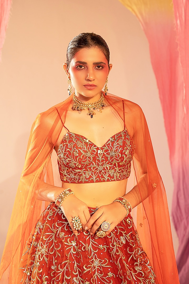 Rust Orange Net & Shantoon Embroidered Wedding Lehenga Set by Silky Bindra at Pernia's Pop Up Shop