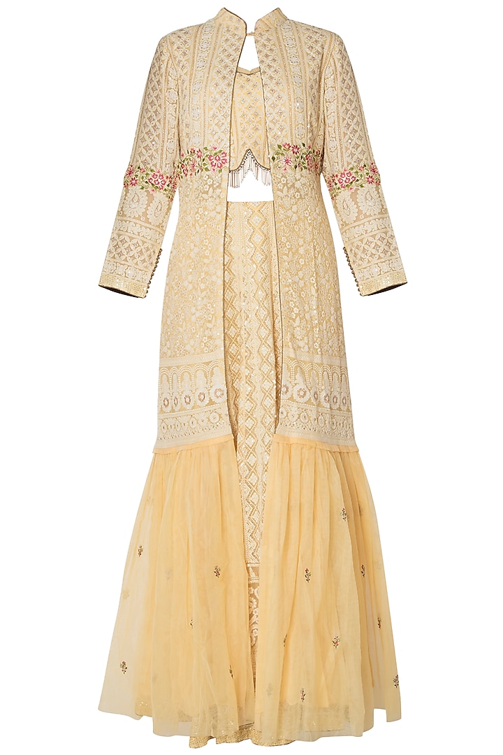 Yellow embroidered lucknowi lehenga skirt with bustier and jacket by SOLE AFFAIR