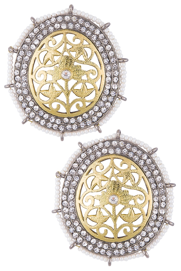 Gold and silver plated diamond earrings by Shillpa Purii