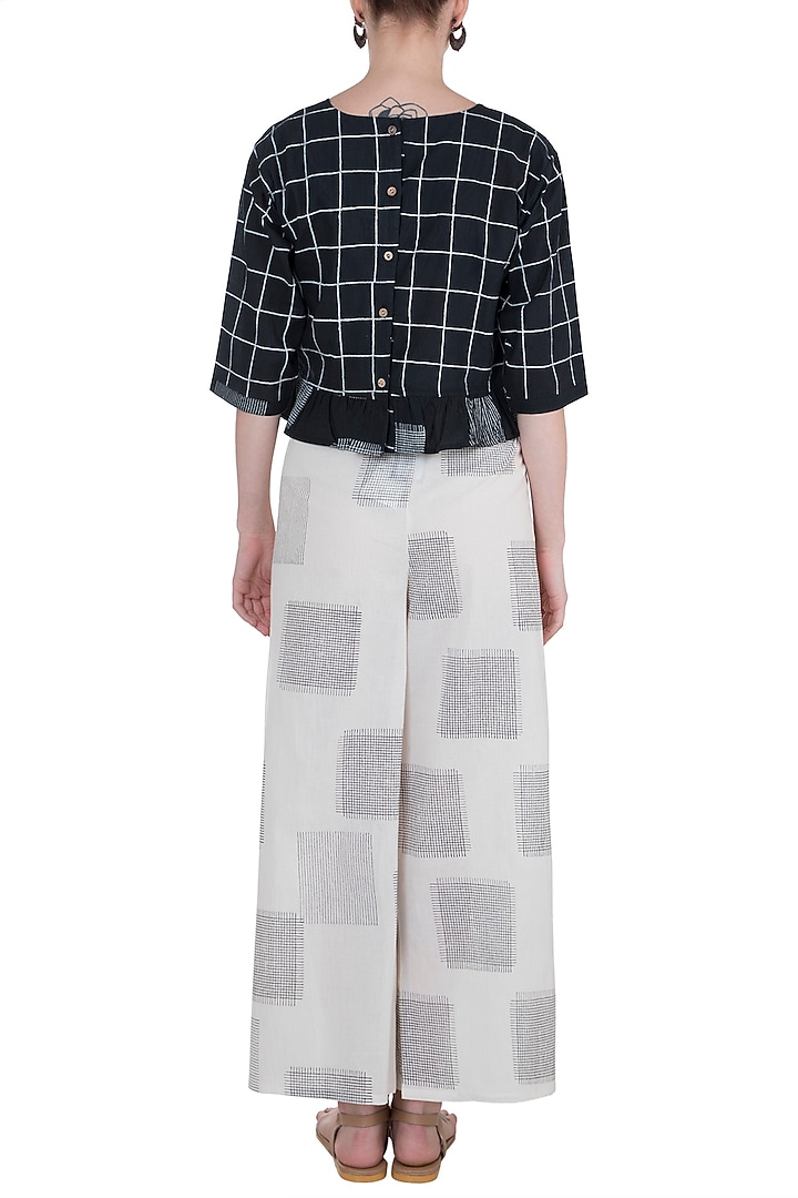 Ivory Hand Block Printed Palazzo Pants by BANANA Labs at Pernia's Pop Up Shop