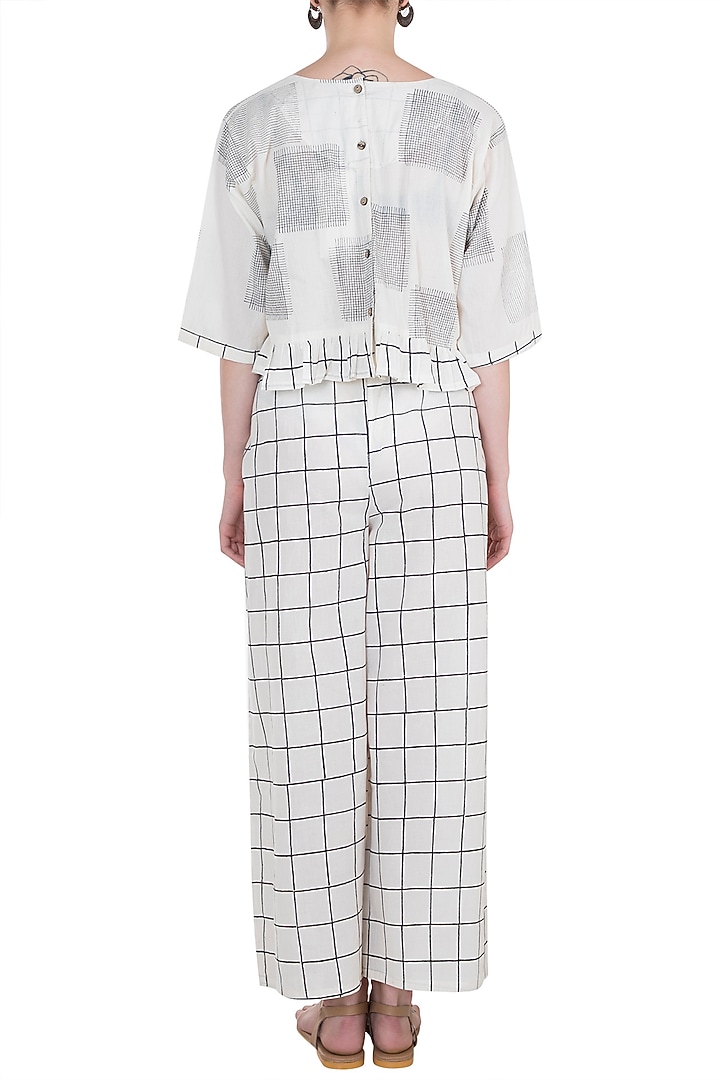Ivory Hand Block Printed Palazzo Pants by BANANA Labs at Pernia's Pop Up Shop