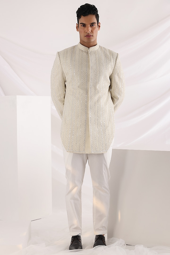 Ivory Linen Satin Embellished Bandhgala Jacket Set by SMRITI APPAREL MEN