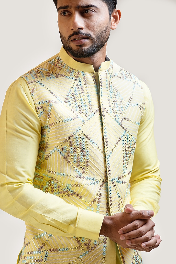 Yellow Bamberg Silk Mirror Embroidered Bundi Jacket by Smriti by Anju Agarwal Men at Pernia's Pop Up Shop