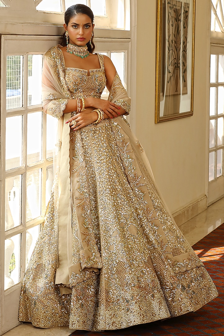 Ivory Silk  Embroidered Bridal Lehenga Set by Miku Kumar at Pernia's Pop Up Shop
