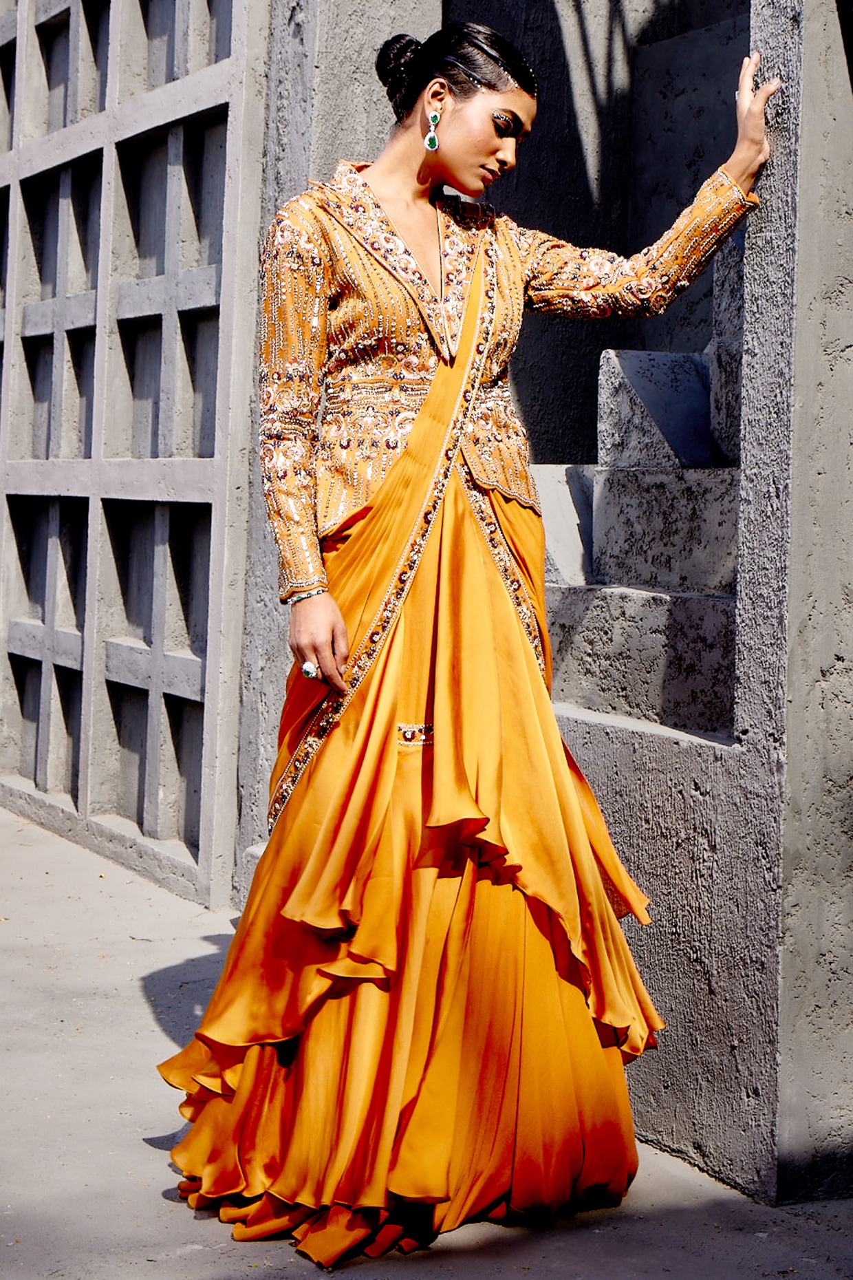 In a black & gold color saree, hip belt and over coat | Saree wearing  styles, Saree trends, Saree models