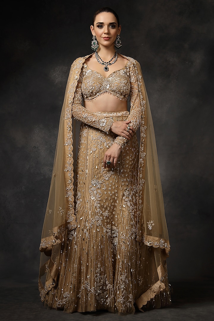 Beige Butterfly Net Sequins Embellished Fish-Cut Bridal Lehenga Set by Miku Kumar at Pernia's Pop Up Shop