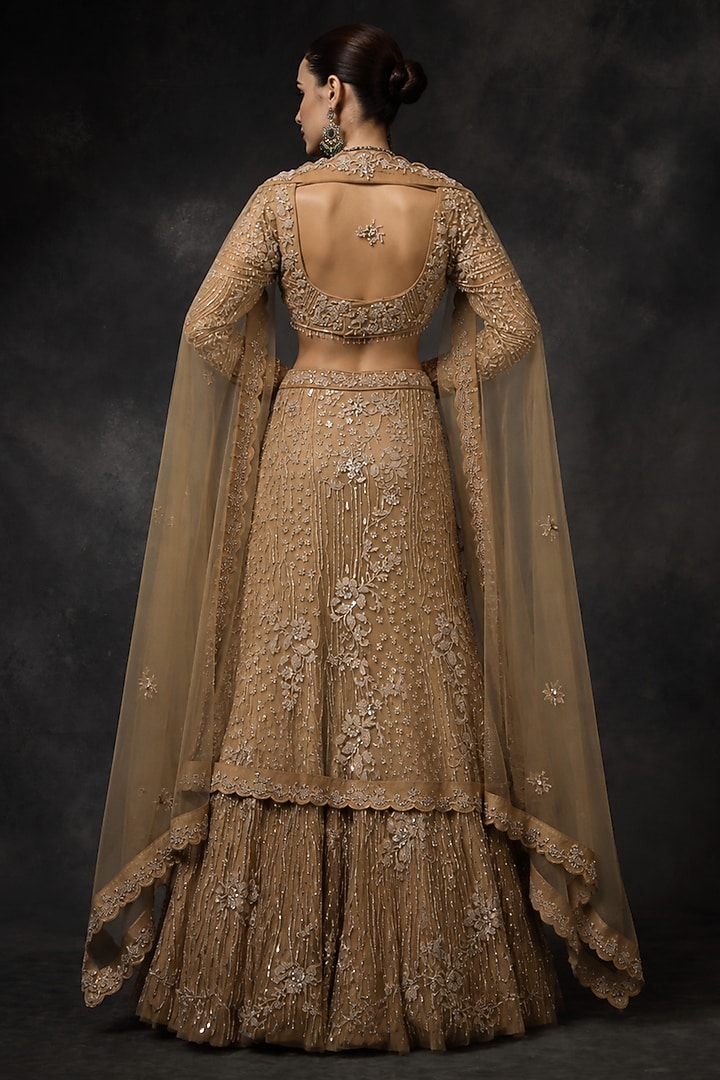 Beige Butterfly Net Sequins Embellished Fish-Cut Bridal Lehenga Set by Miku Kumar at Pernia's Pop Up Shop