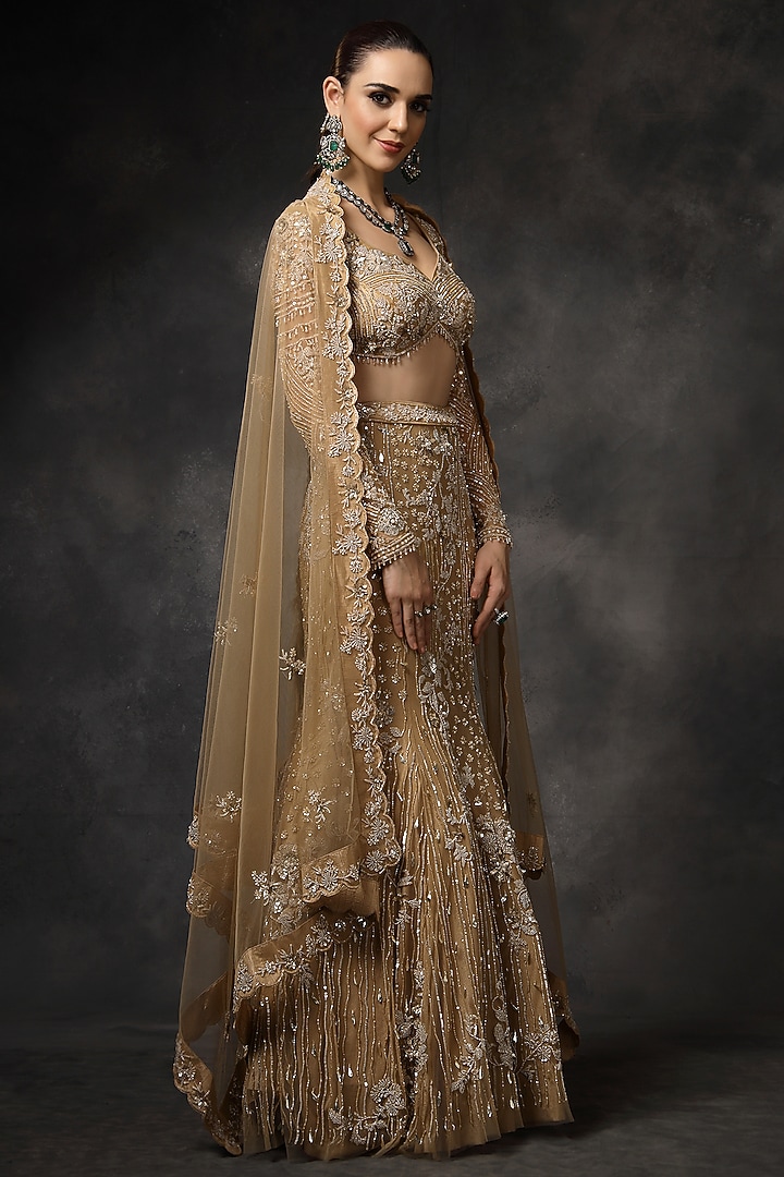 Beige Butterfly Net Sequins Embellished Fish-Cut Bridal Lehenga Set by Miku Kumar at Pernia's Pop Up Shop