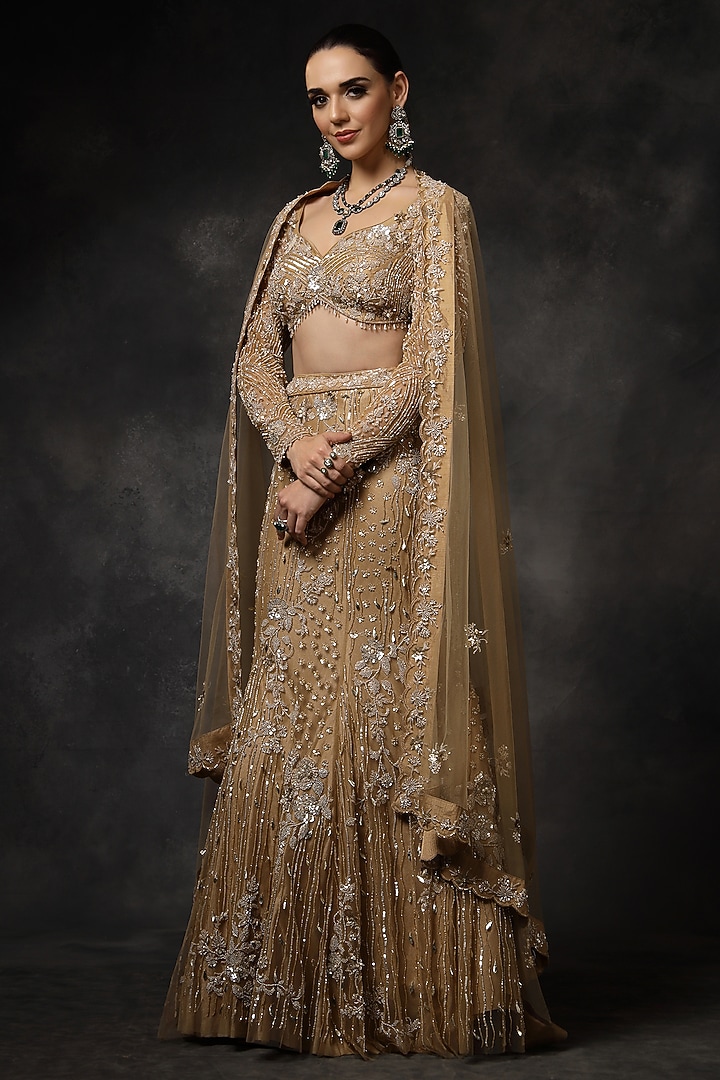 Beige Butterfly Net Sequins Embellished Fish-Cut Bridal Lehenga Set by Miku Kumar at Pernia's Pop Up Shop