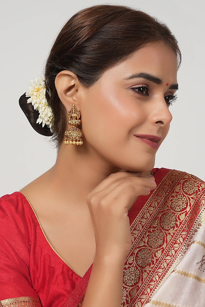 Gold Finish Pearl Maa Lakshmi Temple Jhumka Earrings by SMARS JEWELRY at Pernia's Pop Up Shop