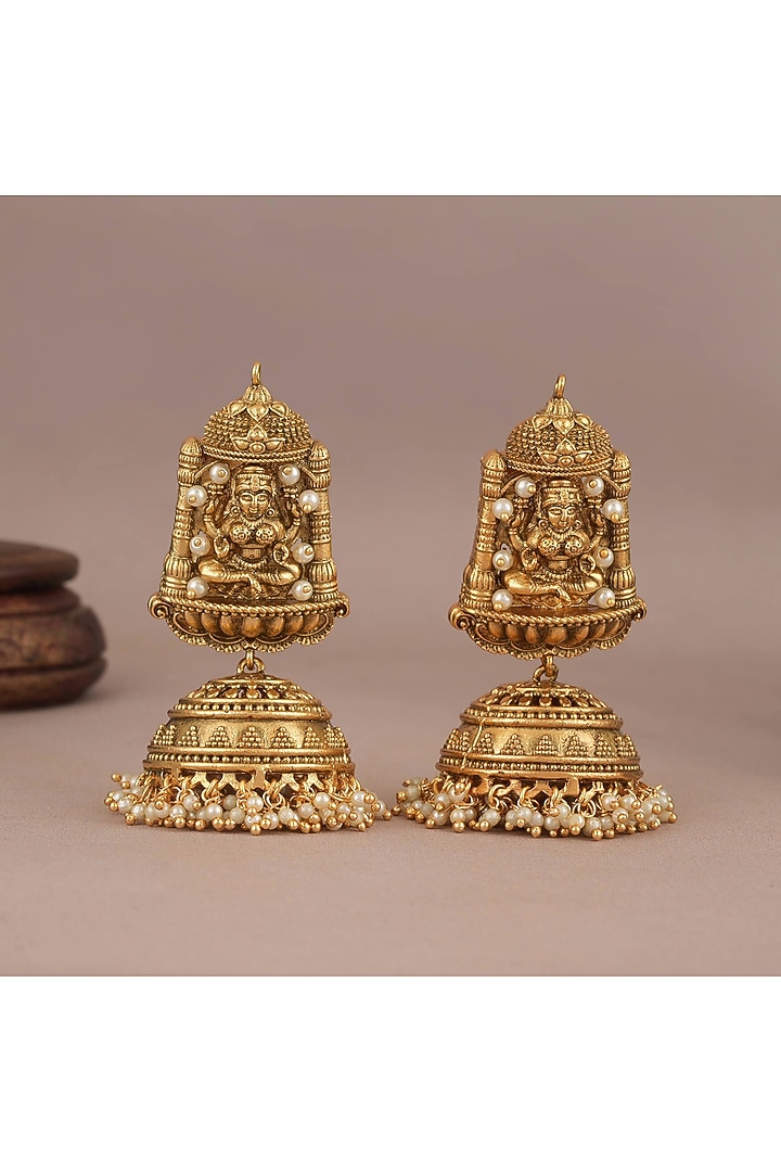 Antique Gold Finish Pearl Drop Lakshmi Temple Jhumka Earrings by SMARS JEWELRY at Pernia's Pop Up Shop