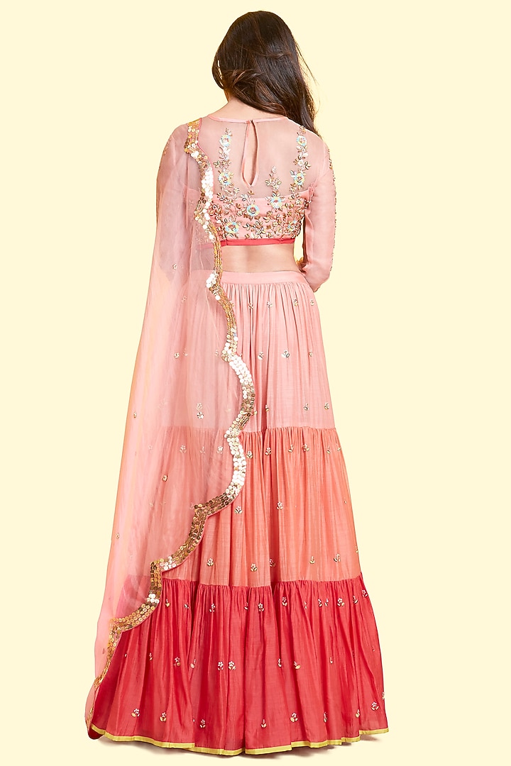 Peach & Coral Tiered Wedding Lehenga Set by Salian By Anushree at Pernia's Pop Up Shop
