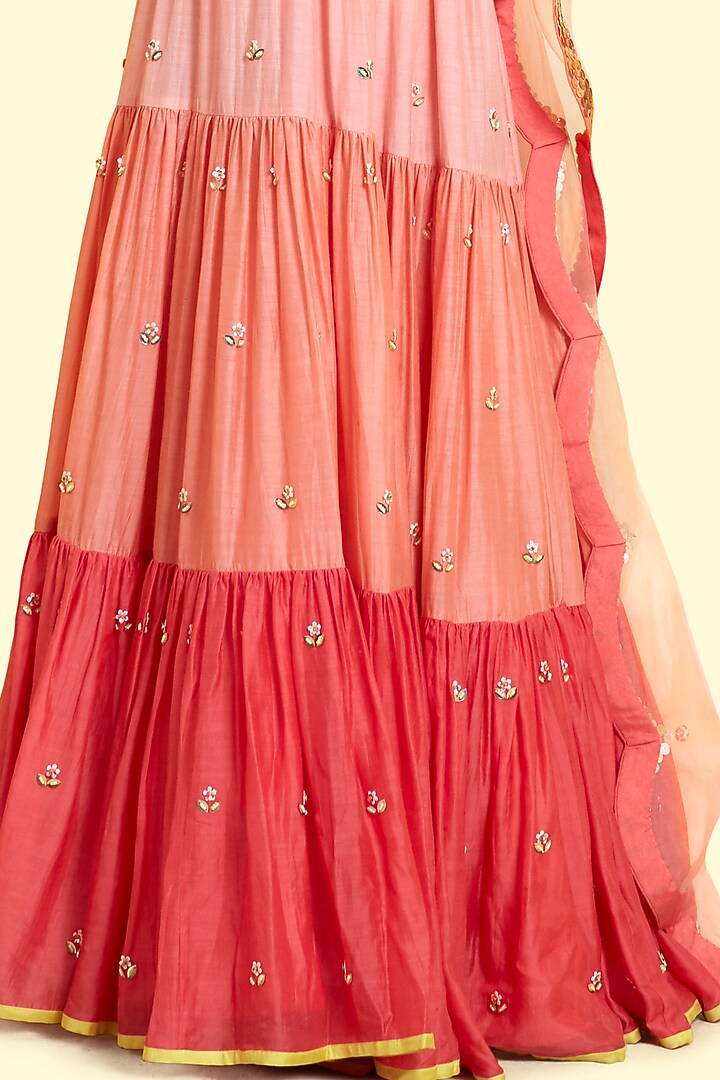 Peach & Coral Tiered Wedding Lehenga Set by Salian By Anushree at Pernia's Pop Up Shop