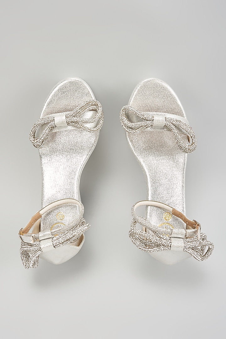 Silver Synthetic Leather Rhinestone Embellished Bow Wedges by Sana K Luxurious Footwear at Pernia's Pop Up Shop