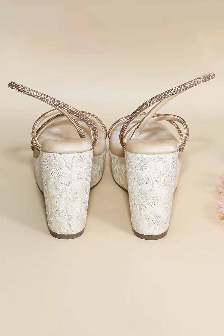 White Synthetic Leather Embellished Wedges by Sana K Luxurious Footwear at Pernia's Pop Up Shop