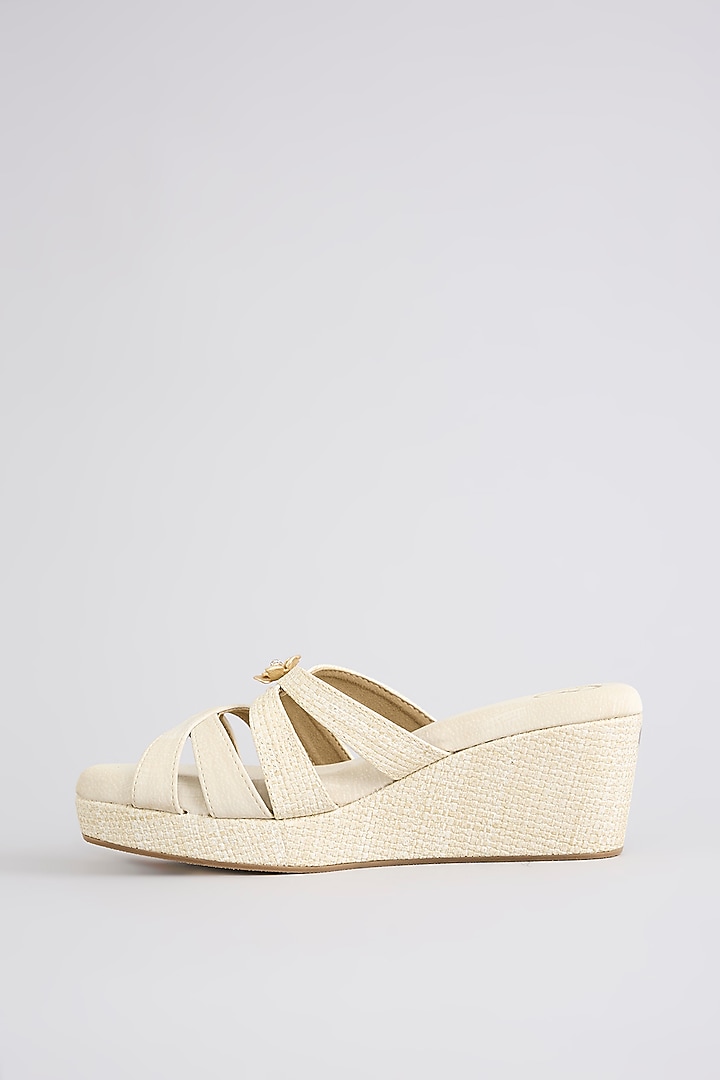 Ivory PU & Synthetic Leather Wedges by Sana K Luxurious Footwear at Pernia's Pop Up Shop