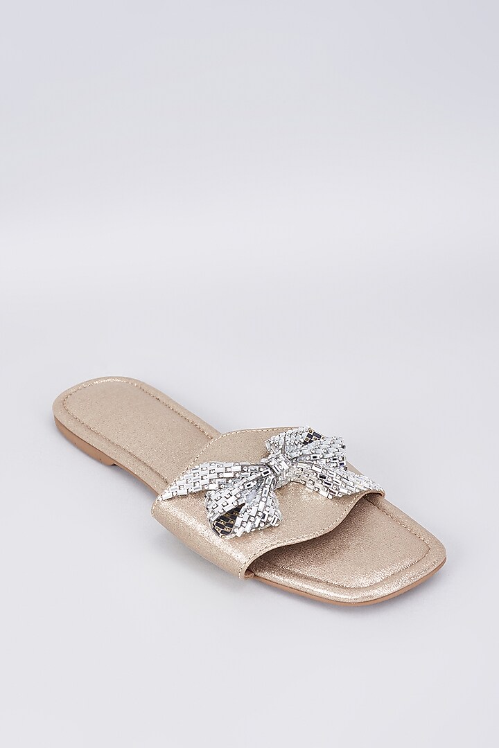 Gold Synthetic & Vegan Crystal Bow Embellished Flats by Sana K Luxurious Footwear at Pernia's Pop Up Shop