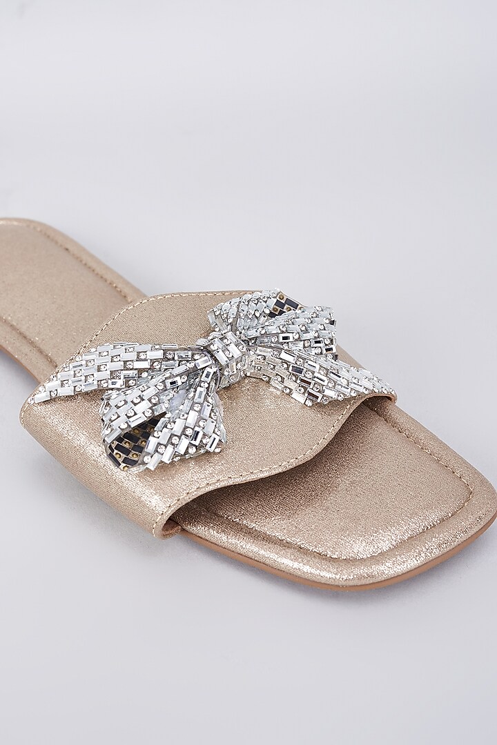 Gold Synthetic & Vegan Crystal Bow Embellished Flats by Sana K Luxurious Footwear at Pernia's Pop Up Shop