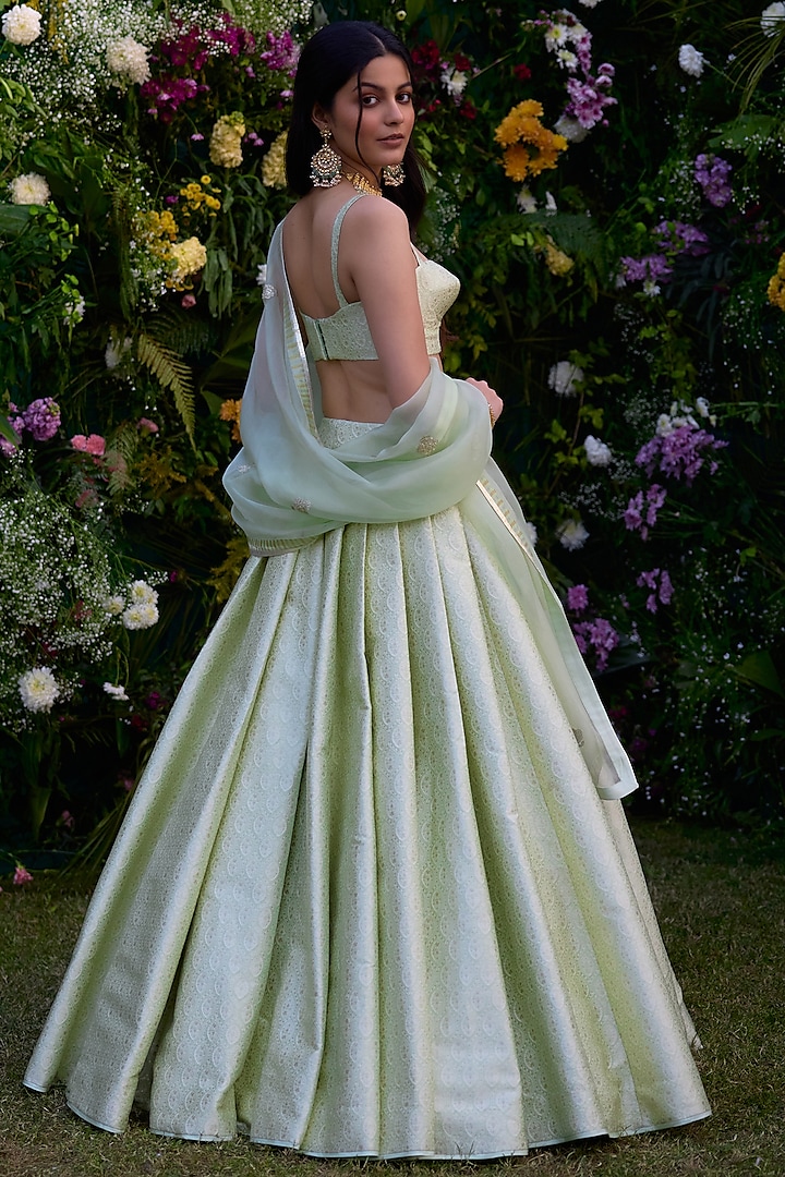 Meadow Mist Green Brocade Patchwork Embroidered Wedding Lehenga Set by Shyam Narayan Prasad at Pernia's Pop Up Shop