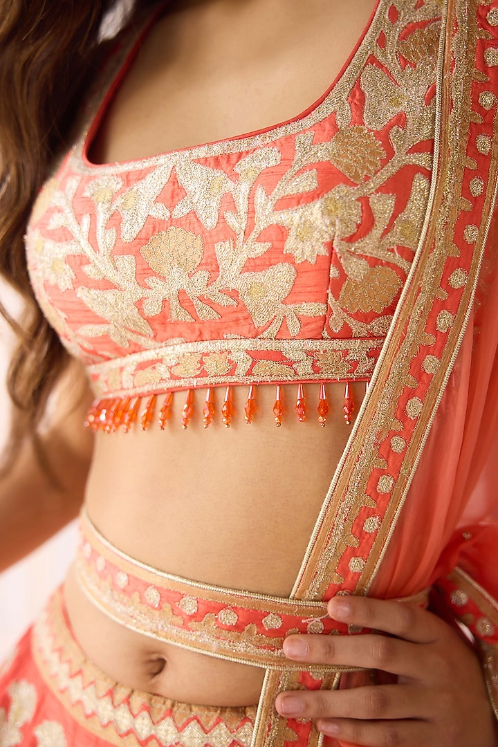 Coral Orange Raw Silk Applique Embroidered Wedding Lehenga Set by Shyam Narayan Prasad at Pernia's Pop Up Shop