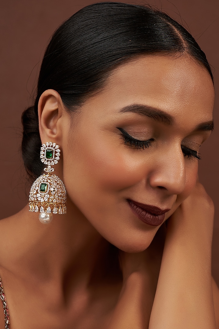Two Tone Finish Cubic Zirconia & Emerald Jhumka Earrings in Sterling Silver by Sneha Rateria