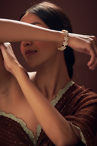 Gold Finish Cubic Zirconia Bangle in Sterling Silver by Sneha Rateria