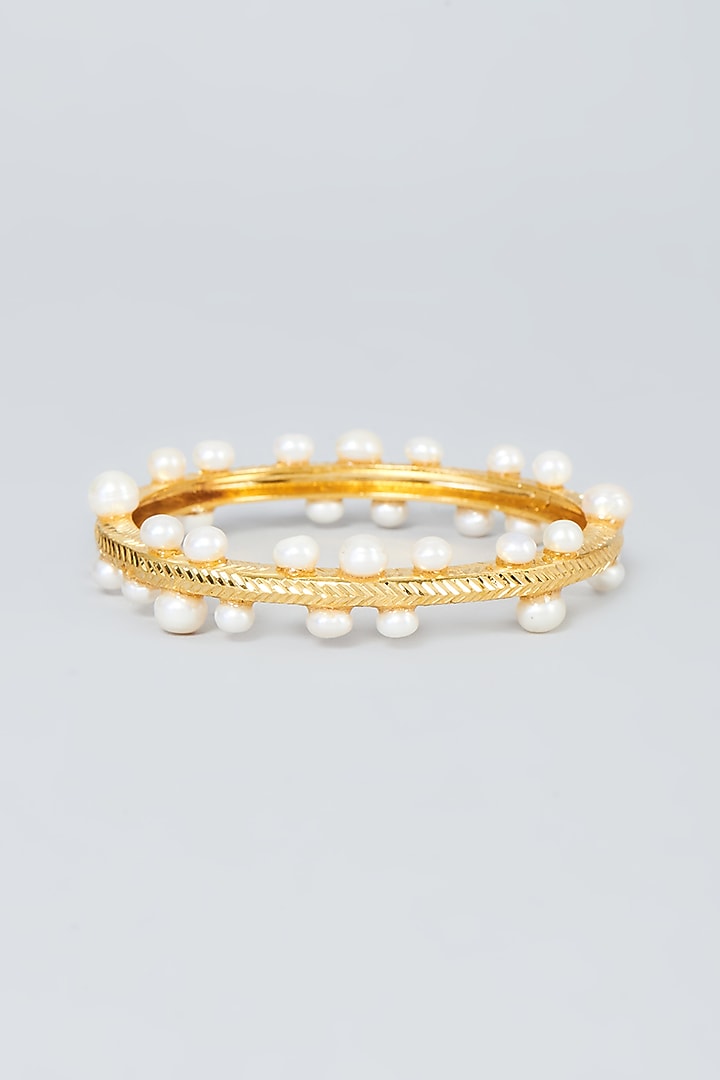 Gold Plated Pearl Bangle in Sterling Silver by Sneha Rateria at Pernia's Pop Up Shop