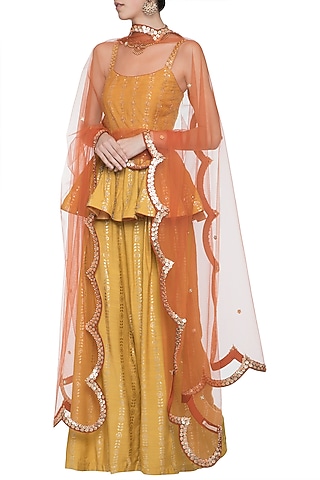 Mustard embroidered foil print peplum top with palazzo pants set by SALIAN BY ANUSHREE