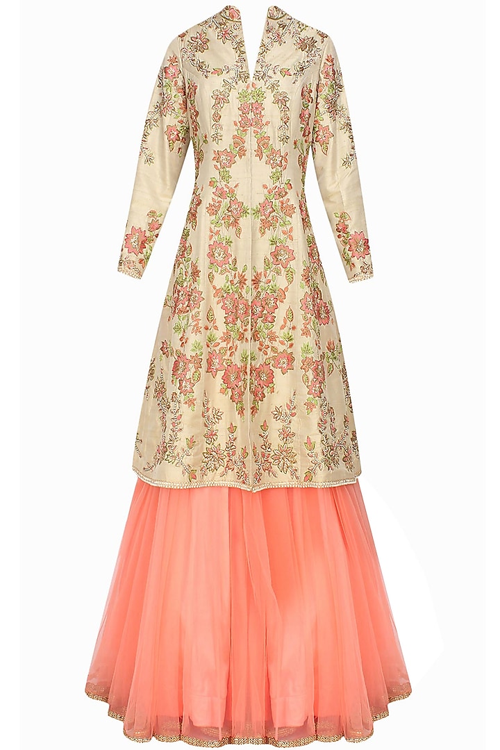 Cream pearls and sequins embellished collared jacket and peach lehenga set by Sanna Mehan