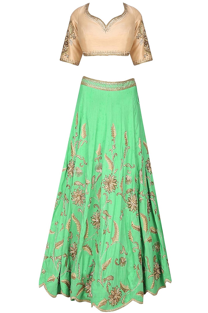 Mint green birds and flowers embroidered lehenga and cream blouse set by Sanna Mehan