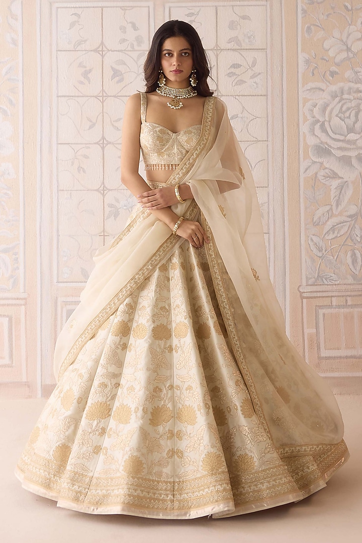 Ivory Raw Silk Applique Embroidered Wedding Lehenga Set by Shyam Narayan Prasad at Pernia's Pop Up Shop