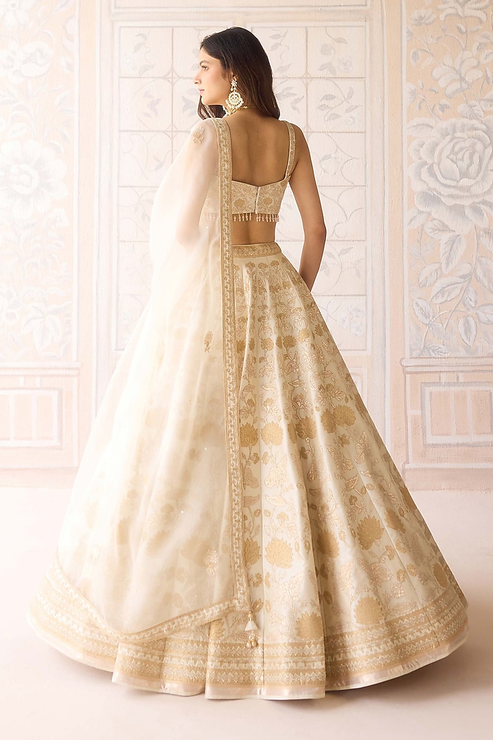 Ivory Raw Silk Applique Embroidered Wedding Lehenga Set by Shyam Narayan Prasad at Pernia's Pop Up Shop