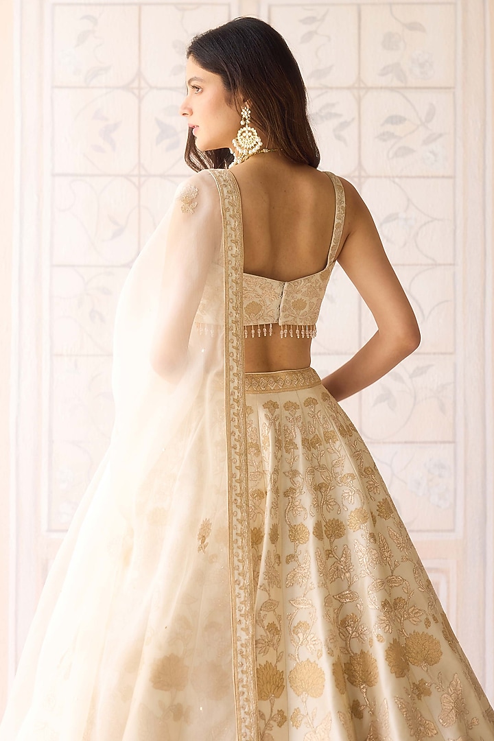 Ivory Raw Silk Applique Embroidered Wedding Lehenga Set by Shyam Narayan Prasad at Pernia's Pop Up Shop