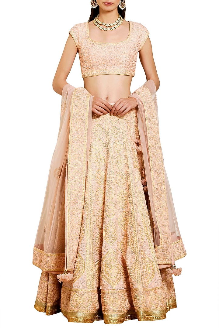 Peach embroidered lehenga set available only at Pernia's Pop Up Shop.