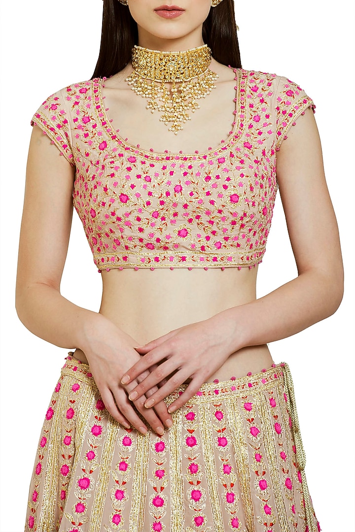 Gold embroidered lehenga set available only at Pernia's Pop Up Shop.