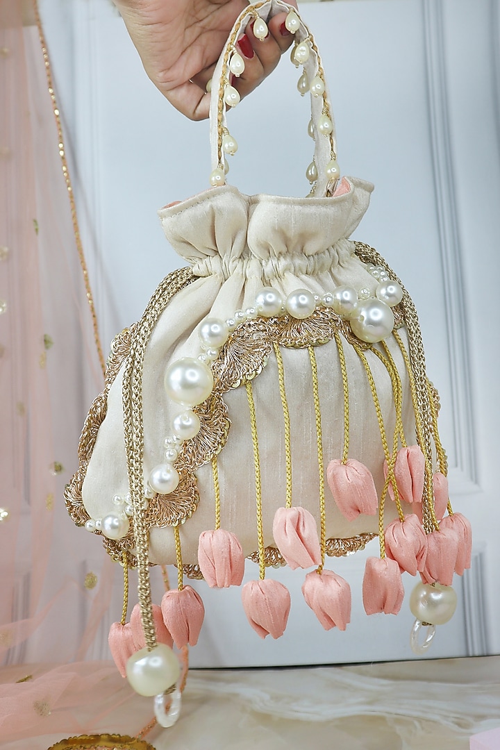 Off-White Silk Pearl Embellished Tulip Cloud Potli by Soho Boho Studio at Pernia's Pop Up Shop