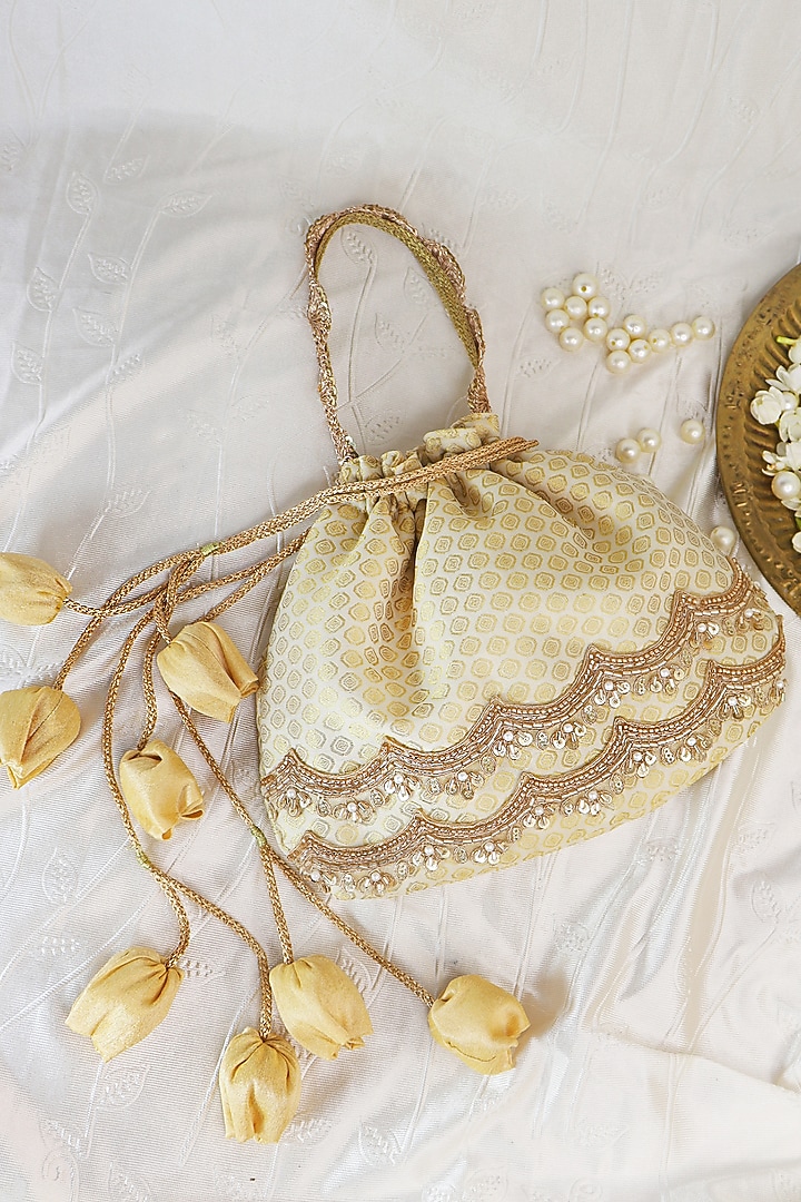 Off-White Silk Hand Embroidered Potli by Soho Boho Studio at Pernia's Pop Up Shop